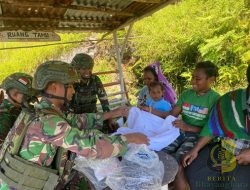 Satgas Yonif 715/Mtl Berbagi Kasih