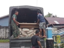 Satgas TMMD ke-124 Kodim 1501/Ternate dan Masyarakat Gotong Royong Angkut Material