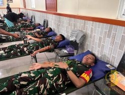 Kodim 1710/Mimika Bersama Garnisun Mimika Bakti Sosial Donor Darah dan Pengobatan Umum